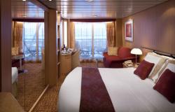 Celebrity Infinity - Celebrity Cruises - kajuta s balkonem a manželskou postelí