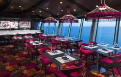 Navigator of the Seas - Royal Caribbean International - jídelní stoly s výhledem na oceán 