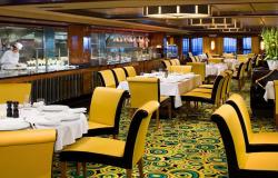 Norwegian Gem - Norwegian Cruise Lines - luxusní žluté židle a jídelní stoly