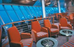 Vision of the Seas - Royal Caribbean International - luxusní a moderní červená křesla 