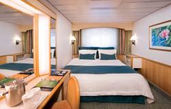 Majesty of the Seas - Royal Caribbean International - kajuta s manželskou postelí